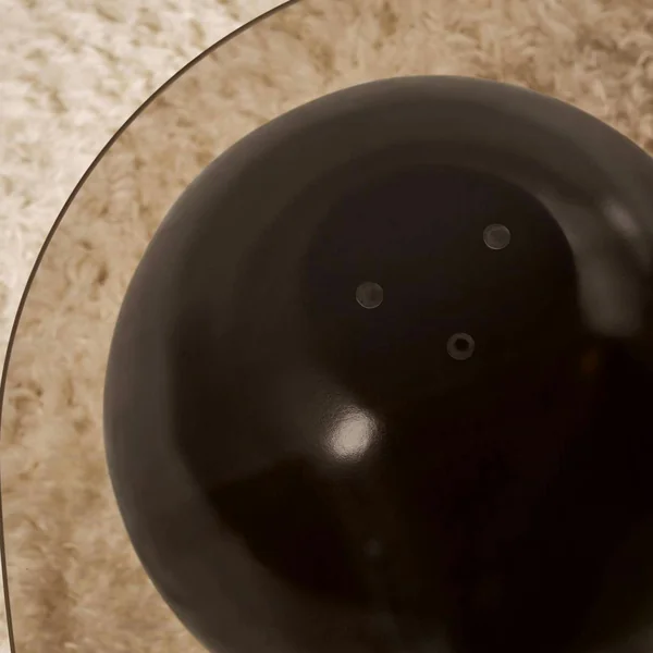 Table basse verre ambré bords arrondis - 4 pieds noirs KOCHI